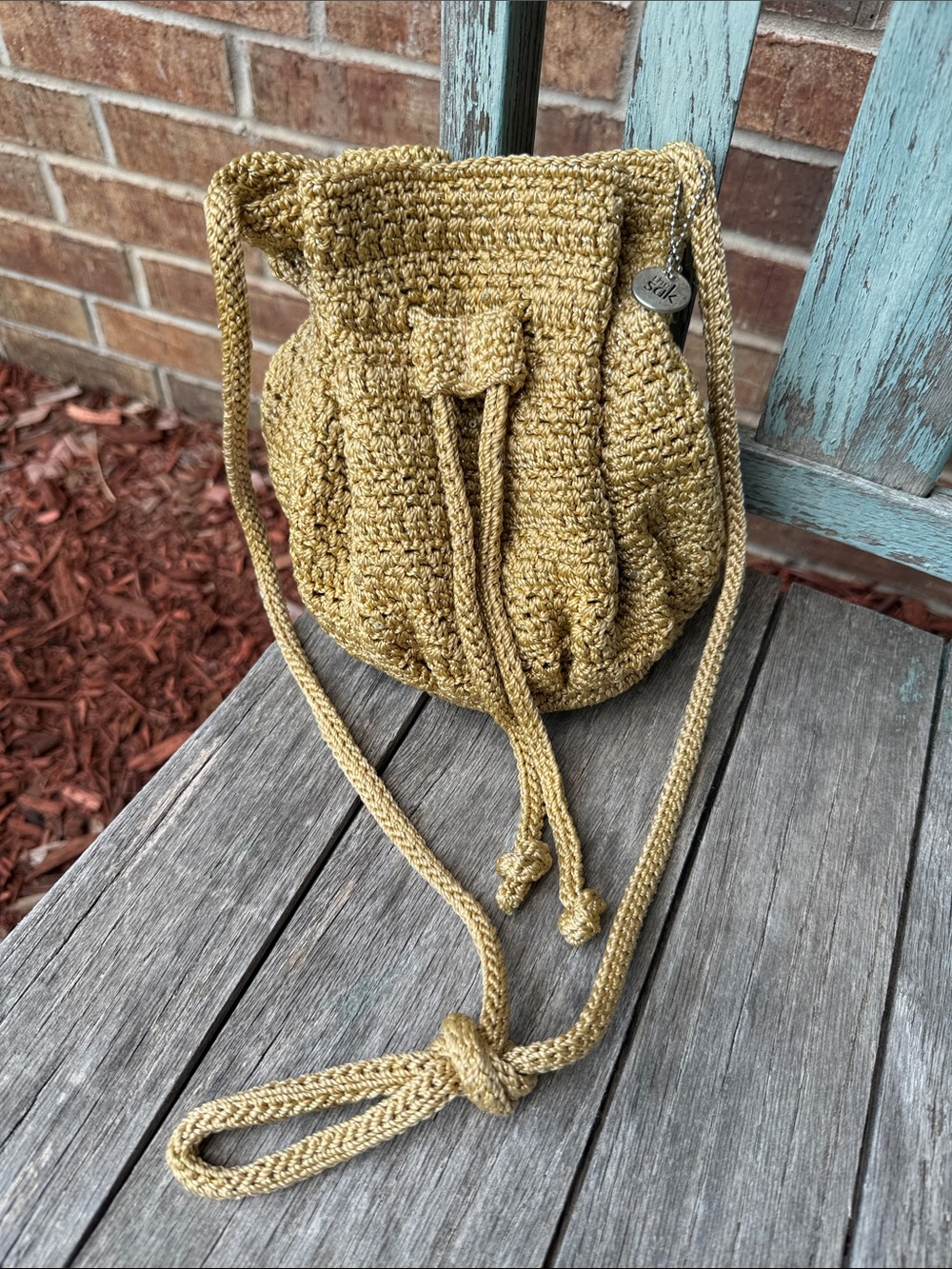 The Sak Tan Handmade Crochet Bucket Drawstring Crossbody Bag